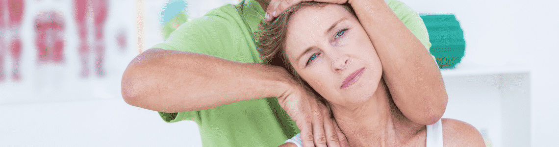 woman getting neck adjusted 