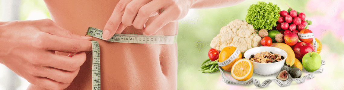 person measuring waste size with a plate of healthy food 